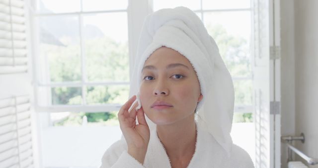Woman Practicing Morning Skincare Routine with Towel Wrapped Around Head - Download Free Stock Images Pikwizard.com
