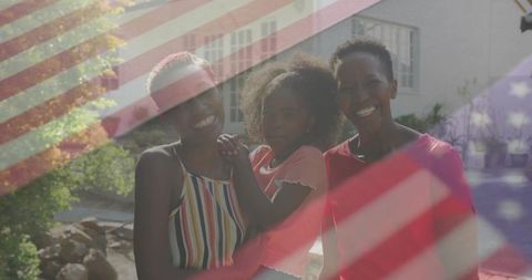 Three Generations Sharing Joy in Backyard with American Flag Overlay