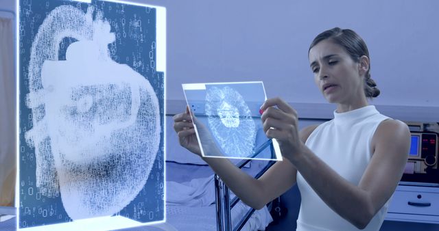 Woman using digital screen in hospital