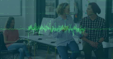 Data Processing Overlay on Colleagues Collaborating in Modern Office