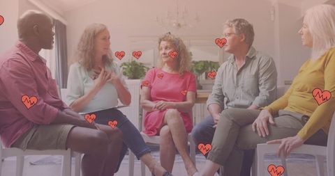 Diverse Senior Group Share Moments Surrounded by Falling Hearts