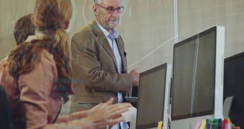 Business Team Analyzing Financial Data at Office Meeting