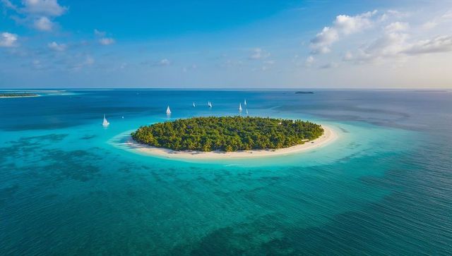 Secluded tropical island white sand palm trees turquoise lagoon sailboats horizon escape