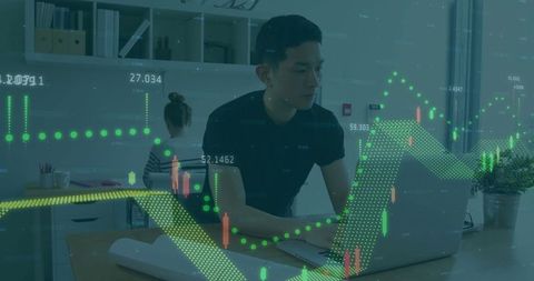 Asian Professional Analyzing Data with Digital Chart Overlay