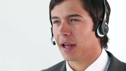Young Businessman Using Headset for Professional Communication