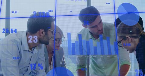 Team analyzing financial data with graph overlays in modern office