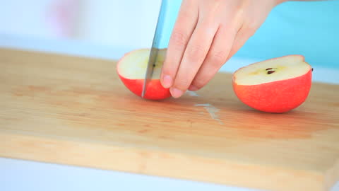 Preparing Fresh Apple Slice on Cutting Board