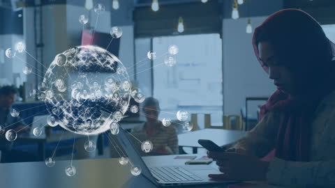 Woman in Hijab Engaging with Global Digital Network Interface