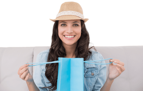 Happy caucasian woman holding shopping bag on transparent background