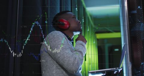 IT Engineer Analyzing Data Processing Trends with Laptop - Download Free Stock Images Pikwizard.com