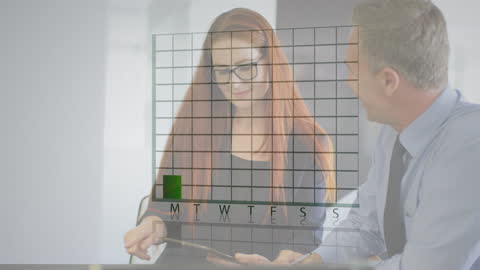 Business Professionals Analyzing Weekly Data Chart Projection