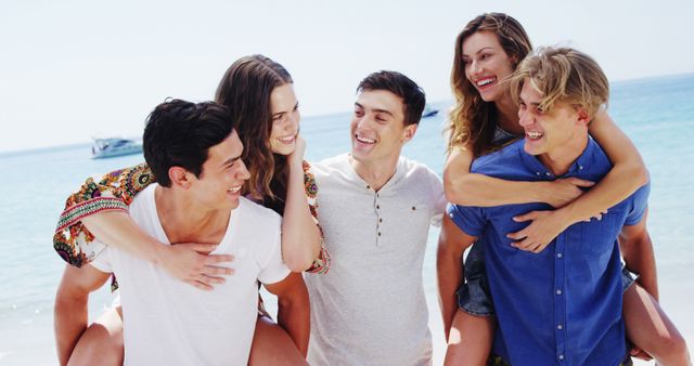 Group of Friends Enjoying a Beach Day Outdoors - Download Free Stock Images Pikwizard.com