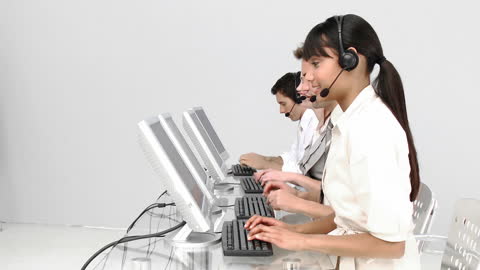 Customer Service Agents Supporting Clients in Modern Call Center