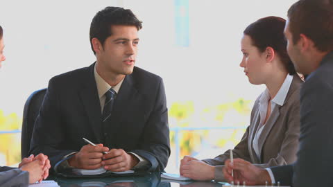 Business Team During Strategic Meeting in Modern Office