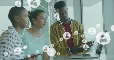 Diverse Professionals Linking Through Digital Network Technology