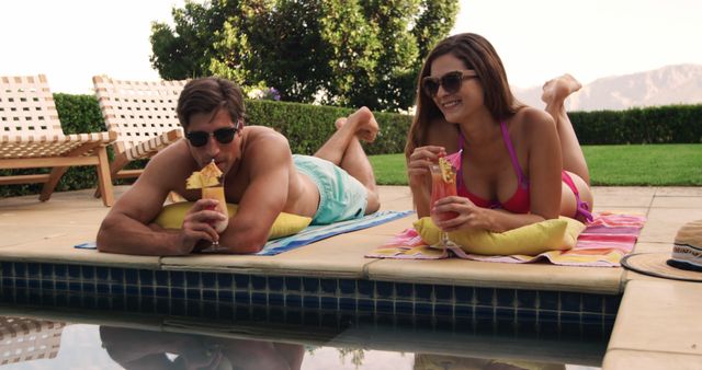 Couple Enjoying Tropical Drinks Poolside on Summer Vacation - Download Free Stock Images Pikwizard.com