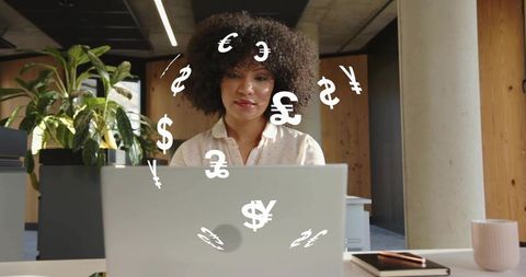 Focused Woman Analyzing Financial Data in Modern Office