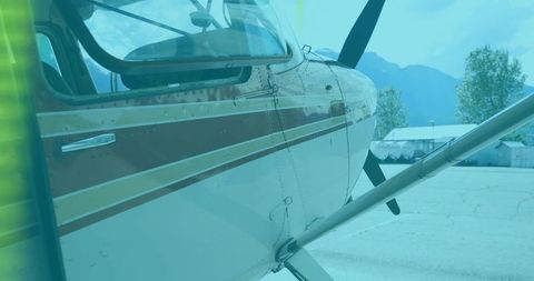 Vintage single-engine aircraft details on airfield apron