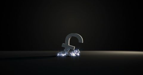 Shiny pound symbol surrounded by glowing lights