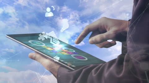 Businessman Using Tablet with Digital Interface Icons