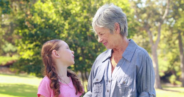 Grandmother and Granddaughter Bonding in Park - Download Free Stock Images Pikwizard.com