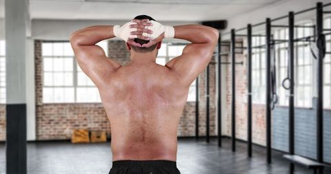 Shirtless Athlete Stretching Neck in Industrial Gym - Download Free Stock Images Pikwizard.com