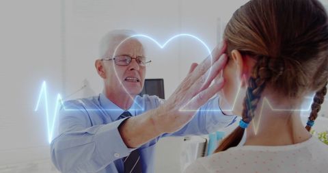 Doctor analyzing patient with digital heartbeat graphic