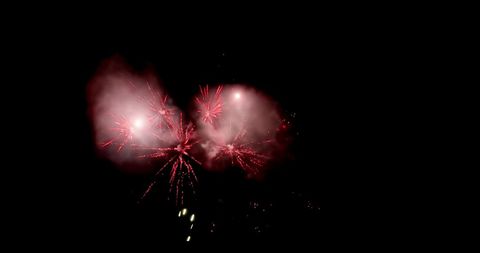 Vibrant Red Fireworks Illuminating Dark Sky - Download Free Stock Images Pikwizard.com