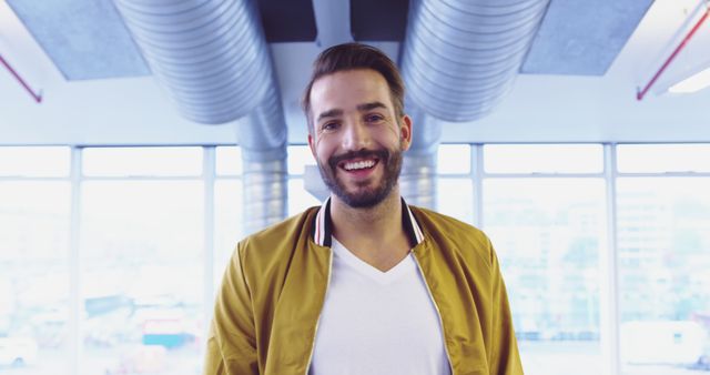 Smiling Man in Casual Jacket in Modern Office Space - Download Free Stock Images Pikwizard.com