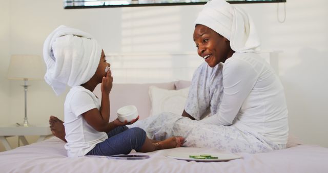 Mother and Daughter Skincare Routine in Bedroom - Download Free Stock Images Pikwizard.com