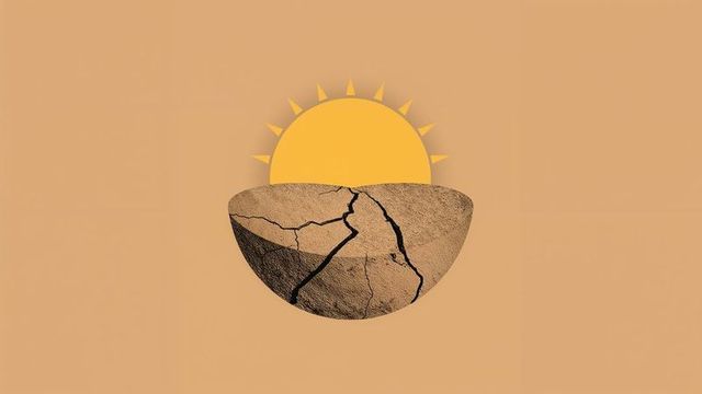 Abstract representation of cracked earth with rising sun