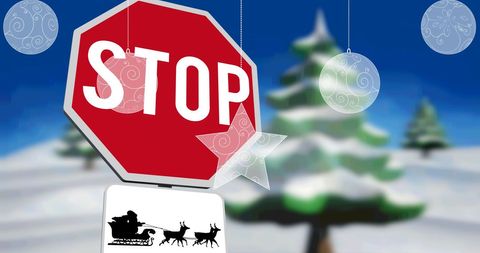 Festive Stop Sign with Santa and Reindeer Silhouette in Snowy Scene - Download Free Stock Images Pikwizard.com