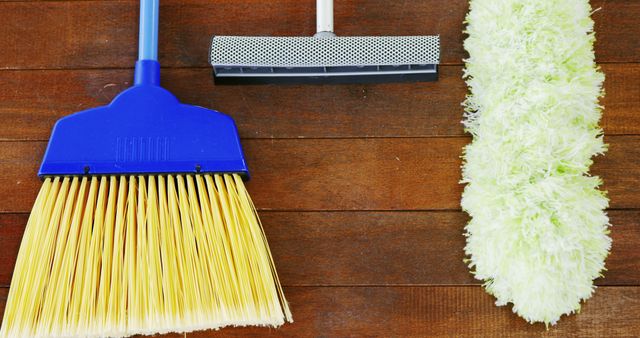 Clean Indoor Sweeping Broom, Mop, and Duster on Wooden Floor - Download Free Stock Images Pikwizard.com