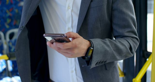 Business Professional Using Smartphone Inside Bus - Download Free Stock Images Pikwizard.com