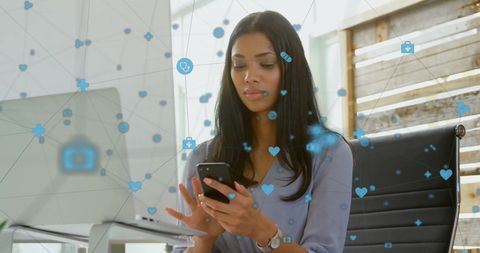 Biracial Woman Engaging with Digital Connectivity on Smartphone - Download Free Stock Images Pikwizard.com