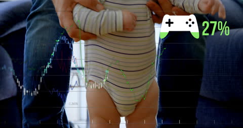 Father Holding Baby with Financial Chart and Gamepad Symbol