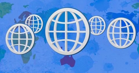 White globes floating over abstract world map background