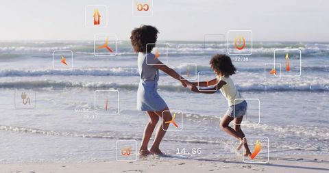 Mother and child playing at shoreline with augmented reality hud icons and ocean waves