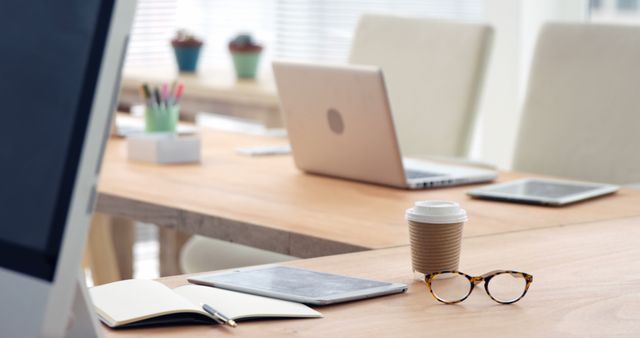 Workspace with Laptop, Tablet, Open Book and Coffee on Desk - Download Free Stock Images Pikwizard.com