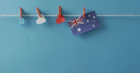 Australian Flag Hanging Decoratively with Heart Shapes on Blue Background - Download Free Stock Images Pikwizard.com