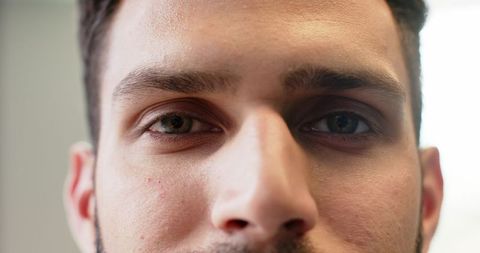 Close-up of thoughtful man showing determination and reflection