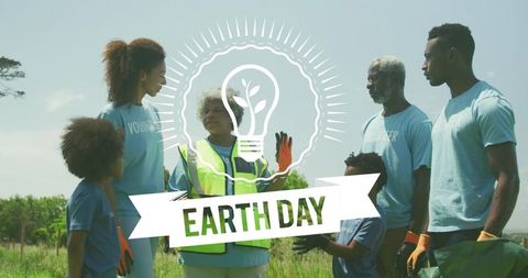 Leading Senior Volunteer Directing Multigenerational Meadow Cleanup for Earth Day Community