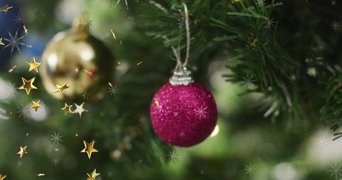 Christmas Tree with Glittering Baubles and Falling Stars - Download Free Stock Images Pikwizard.com