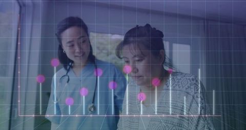 Healthcare Professional and Patient Analyzing Medical Data