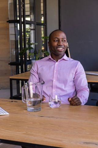 Professional Man in Modern Office Enjoying Productive Day