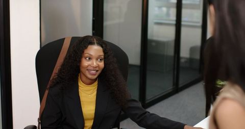 Professional advisor engaging with client in modern office environment