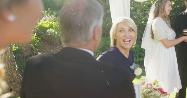 Joyful wedding ceremony with family, bride and guests celebrating - Download Free Stock Images Pikwizard.com