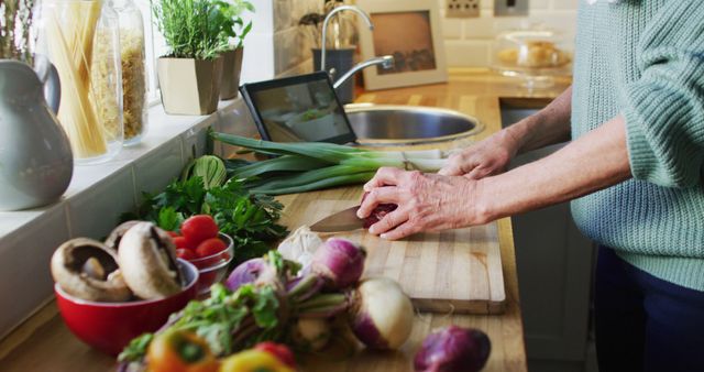 Person Chopping Vegetables in Kitchen for Healthy Meal Preparation - Download Free Stock Images Pikwizard.com