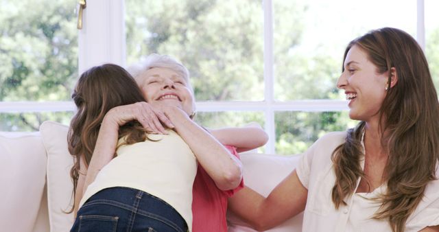Three Generations of Women Hugging and Celebrating Family Time - Download Free Stock Images Pikwizard.com