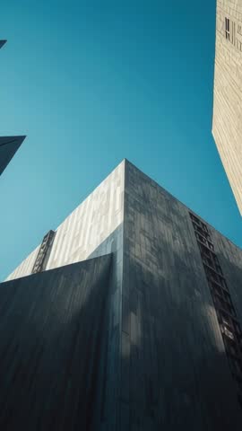 Tilting Up to Apex Revealing Geometric Facade in Urban Canyon Vertical Video